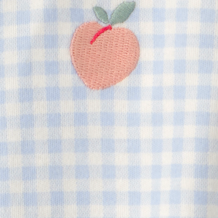 Pijama enteriza cuadros celestes con durazno para bebé niña 🍑💙