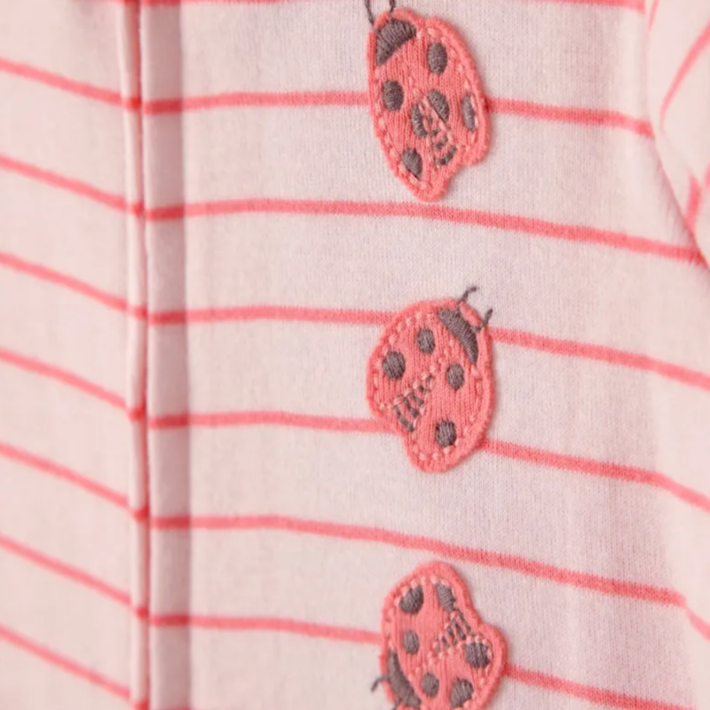 Pijama de 1 pieza estampado de catarinas para bebita