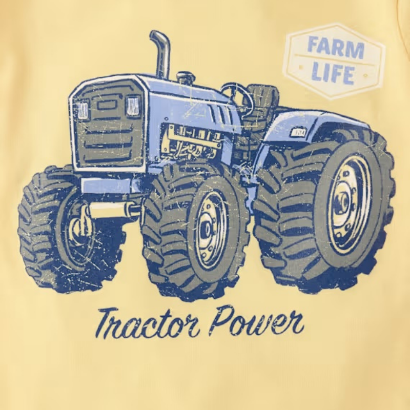 Camiseta amarilla con tractor para niño