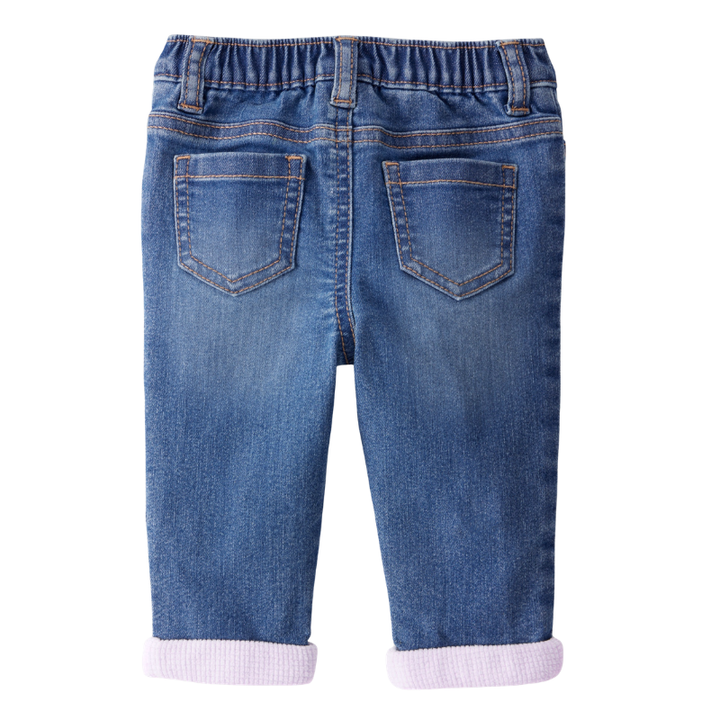 Jeans con detalle en ruedos para bebita