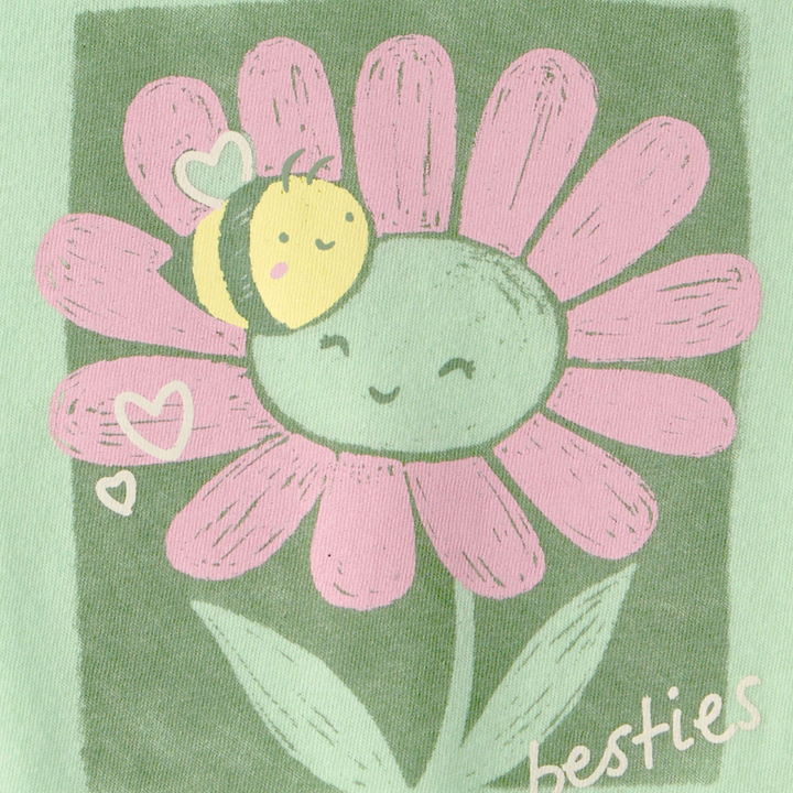 Camiseta verde con flor para niña