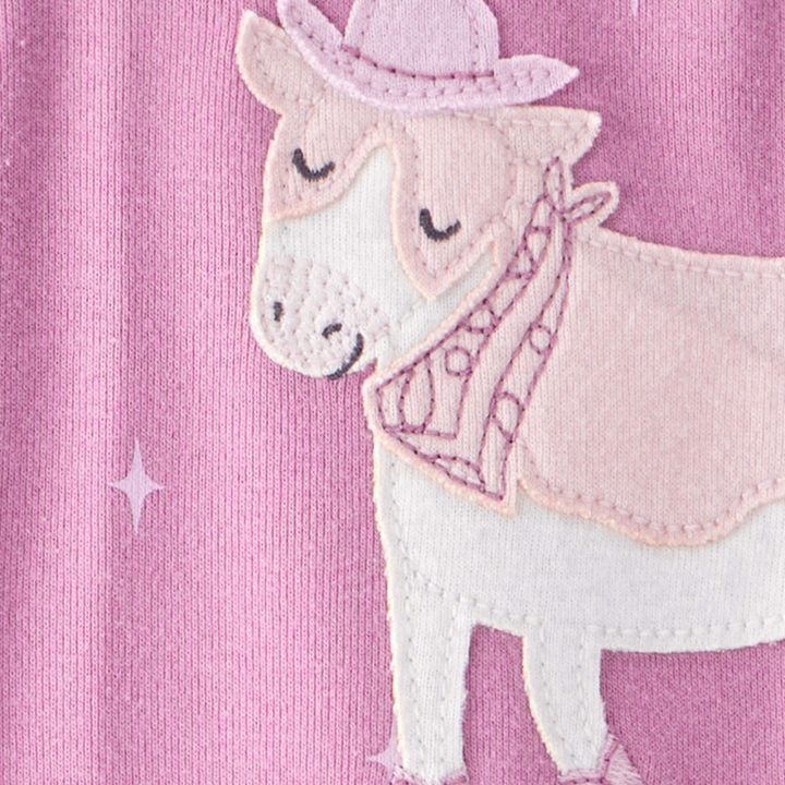Pijama entera con piecitos y vaquita para bebita