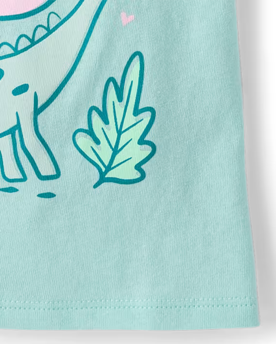 Blusa celeste con dinosaurios para niña