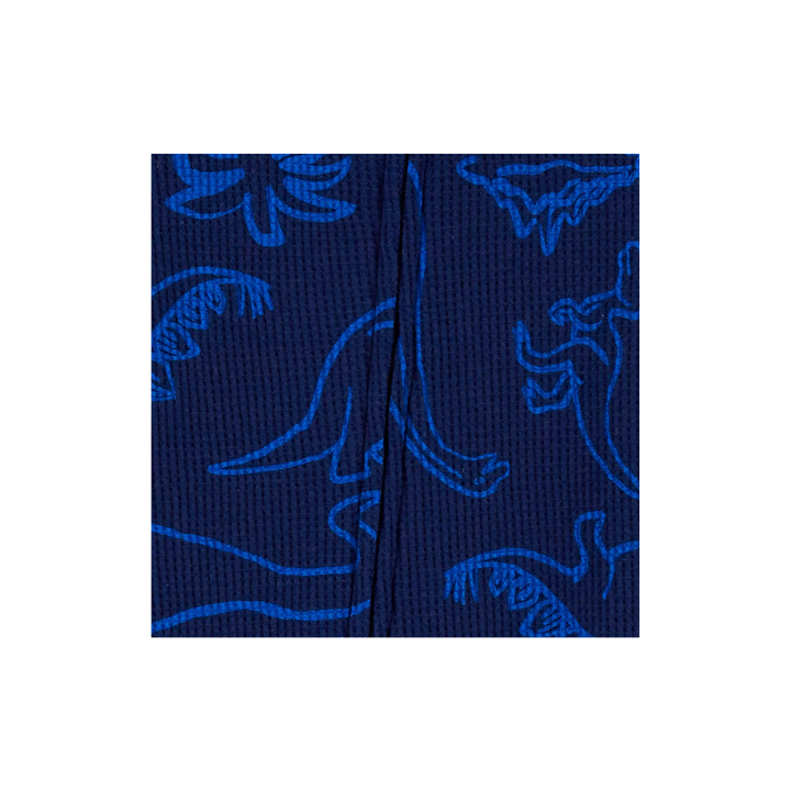 Pijama 1 pieza dino y palmeras