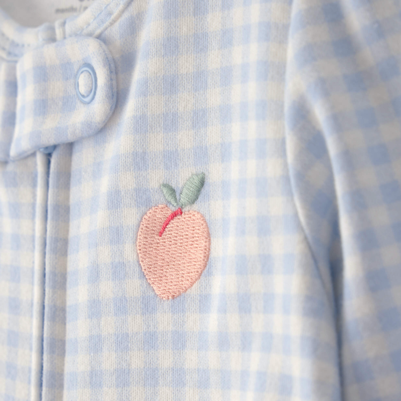 Pijama enteriza cuadros celestes con durazno para bebé niña 🍑💙